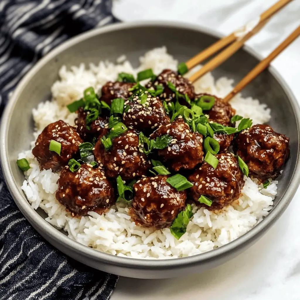 These 30-minute Mongolian Beef Meatballs are packed with flavor and are super easy to make! Juicy meatballs are coated in a savory Mongolian sauce featuring soy sauce, ginger, and garlic. Perfect for a family dinner or a quick weeknight meal. Save this recipe to impress your friends with a delicious Asian-inspired dish any night of the week!