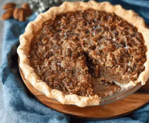 Delicious homemade Brown Sugar Pecan Pie topped with toasted pecans and golden crust, perfect for dessert or special occasions.