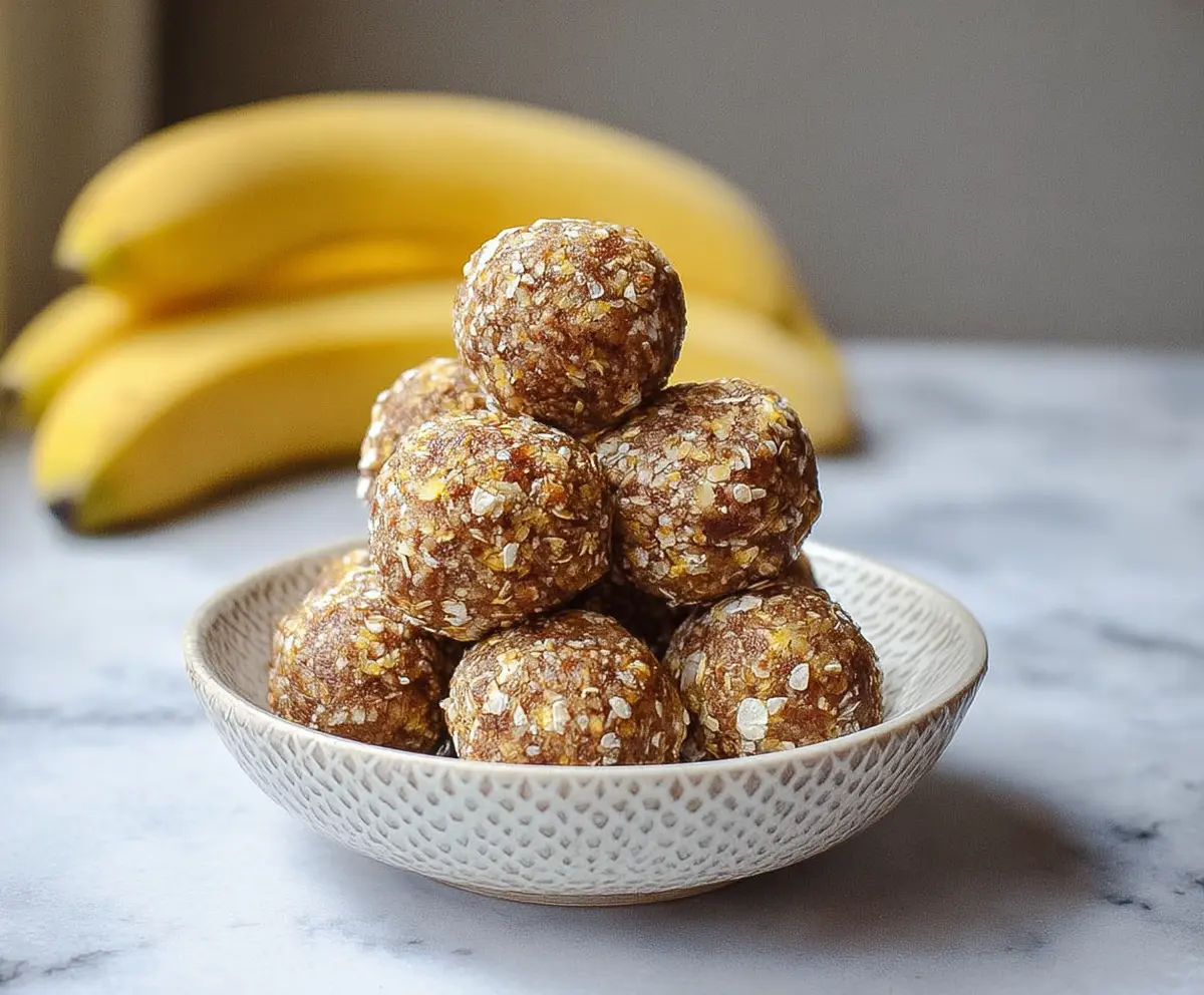 Healthy banana energy balls made with oats, honey, and chia seeds for a nutritious snack.