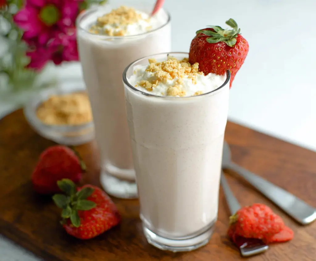 Creamy cottage cheese shake with fresh fruit and honey served in a glass