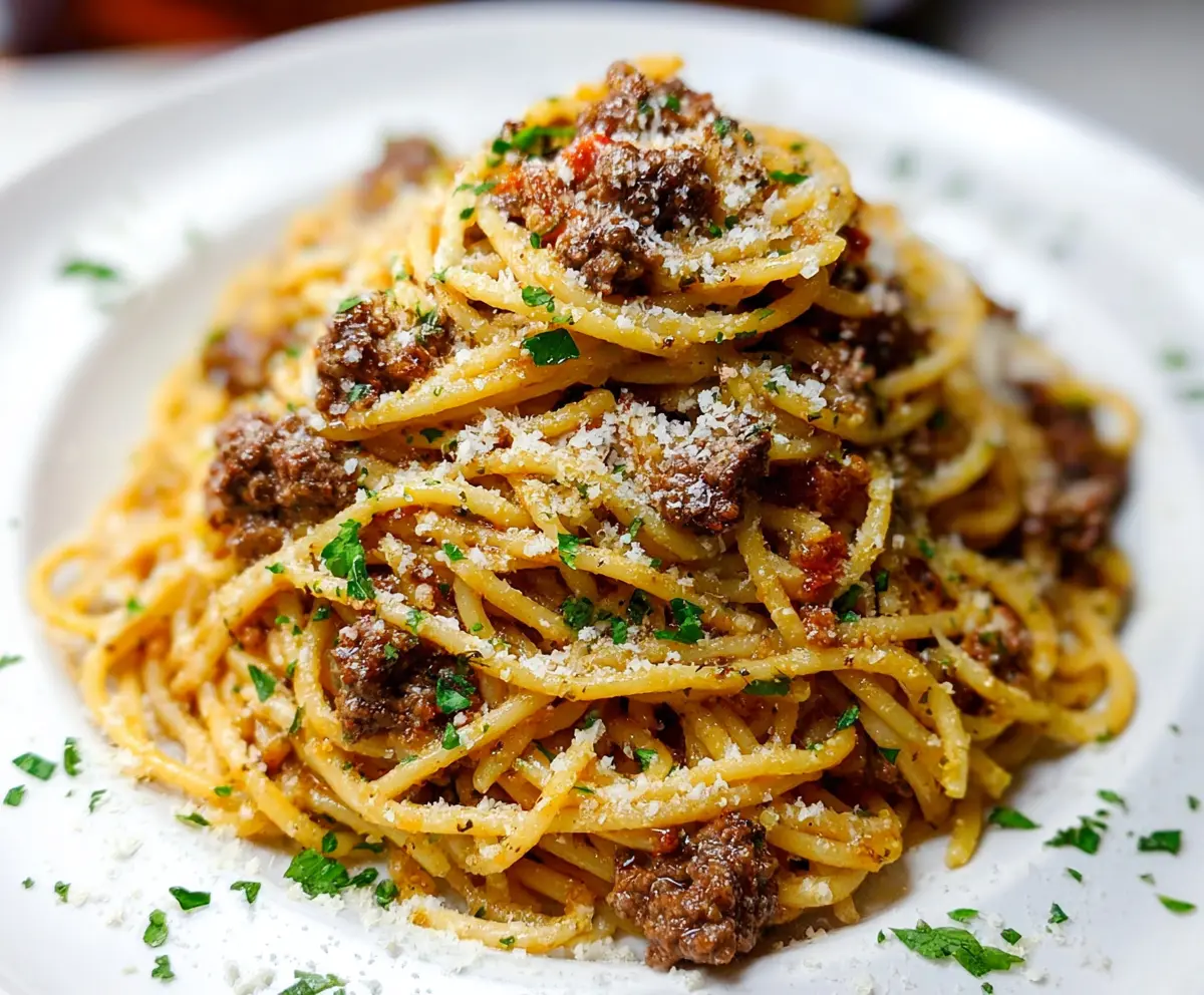 Delicious Cajun Beef Spaghetti with flavorful spices and pasta on a plate.