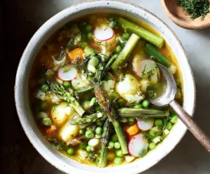 Delicious one-pot spring vegetable soup with fresh seasonal vegetables in a hearty bowl.