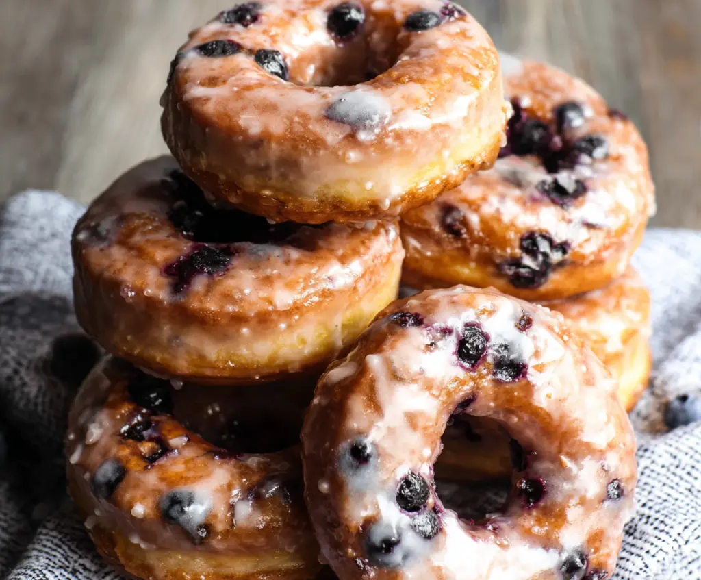 Delicious blueberry cake donuts with fresh blueberries and a sweet glaze.
